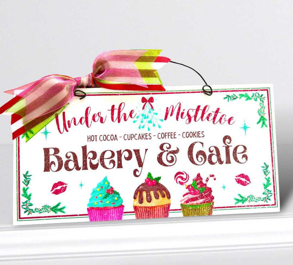 Under the Mistletoe Bakery and Cafe sign. Wood or metal option.