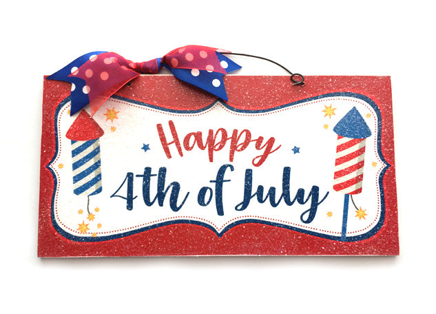 Happy 4th of July sign. Firecrackers.
