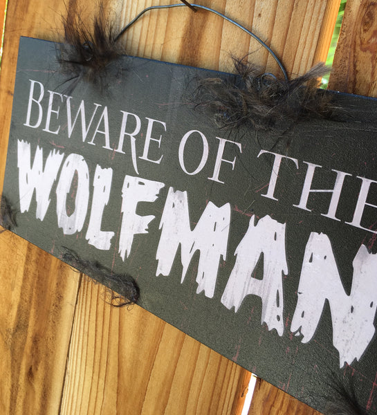 Beware of the Wolfman sign.
