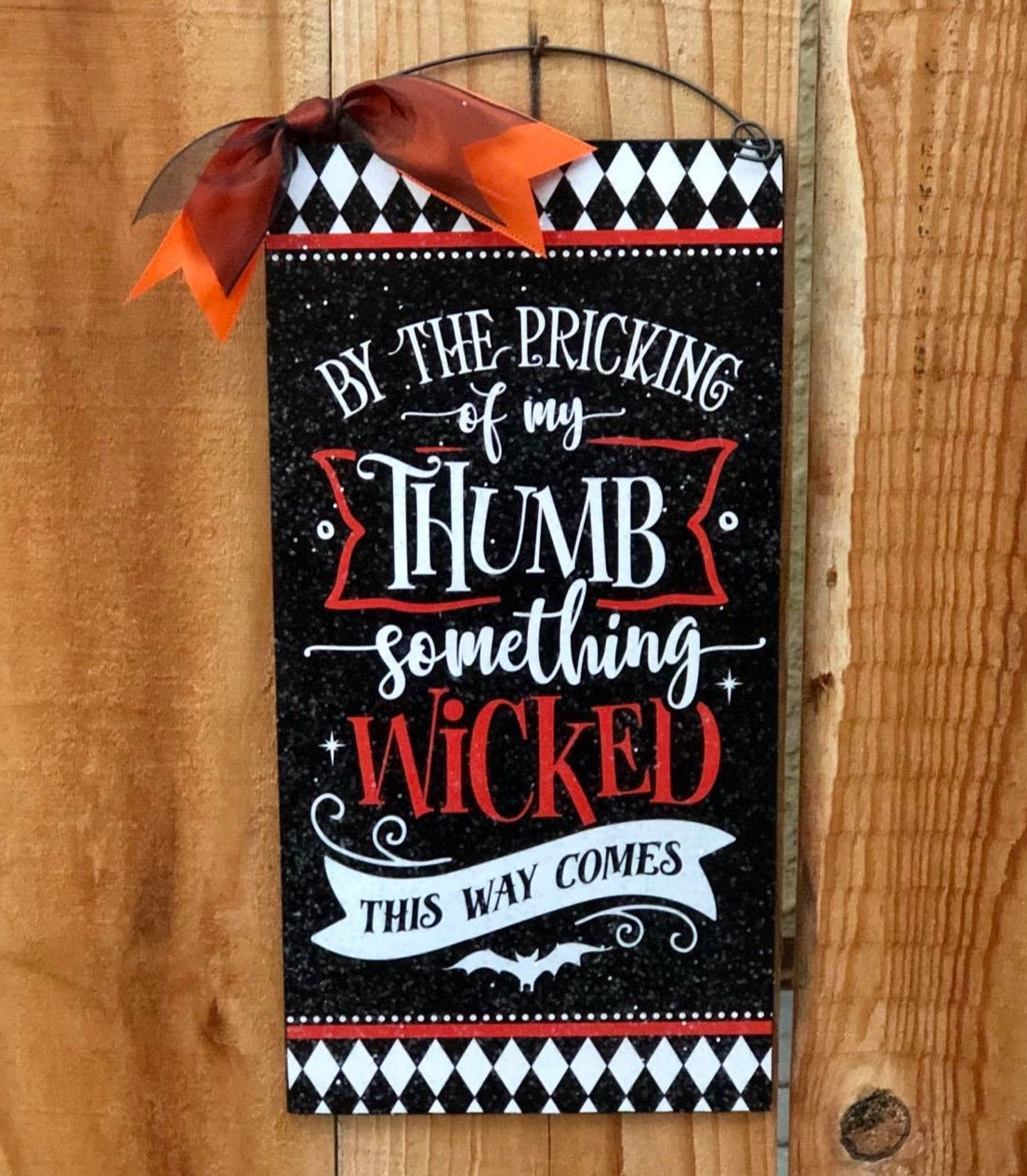 Something wicked this way comes sign.