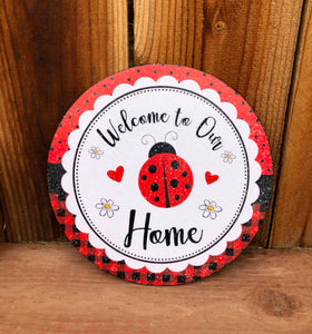 Welcome to our Home Ladybug round sign.