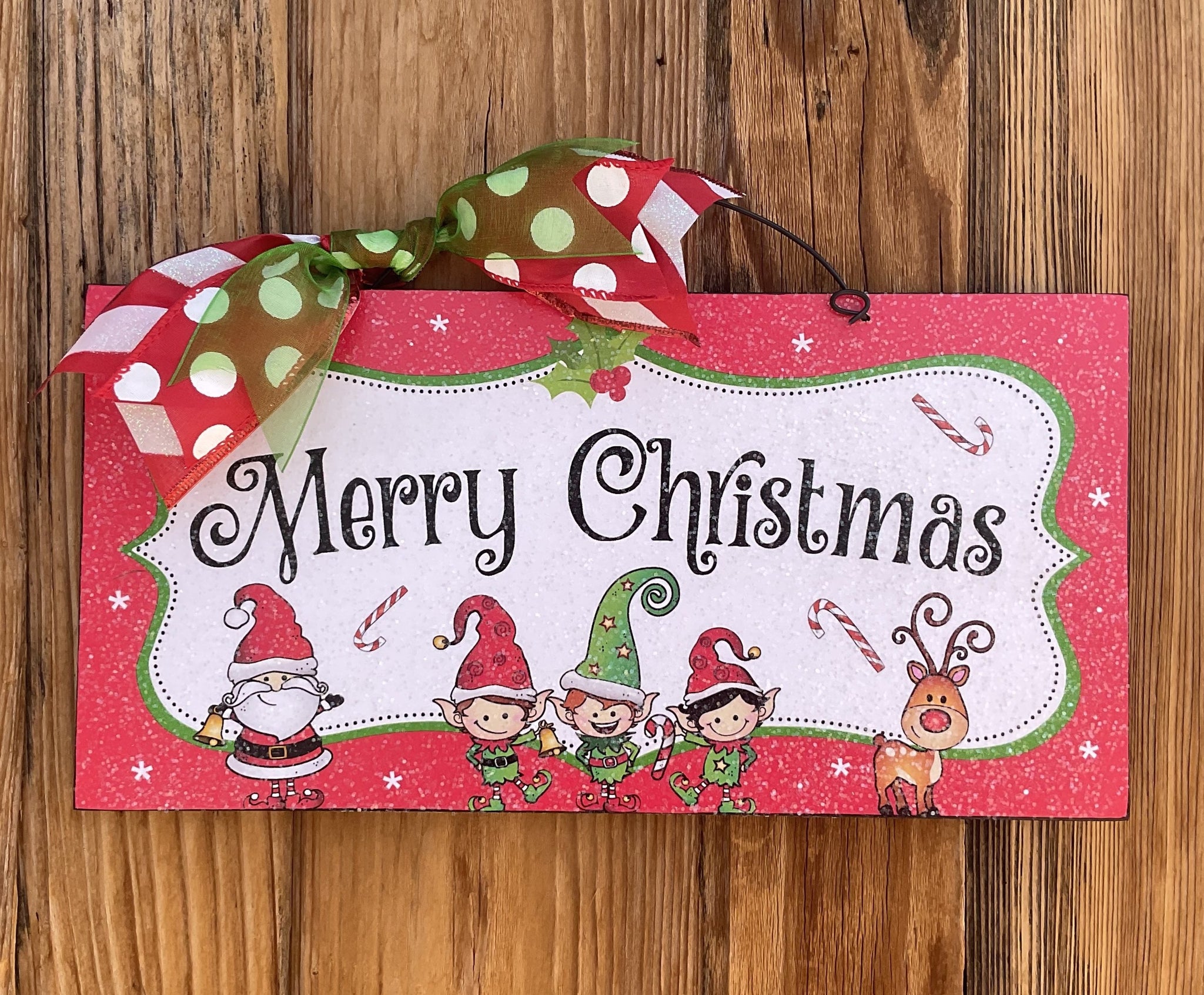 Merry Christmas Elves sign.