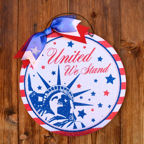 United We Stand round sign.