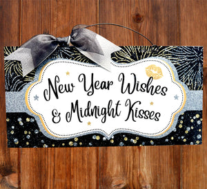 New Year wishes and Midnight Kisses sign.