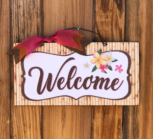 Welcome Plumeria sign.