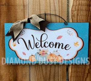 Welcome teal pumpkin sign.