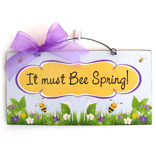 It must be Spring. Spring sign with bees.