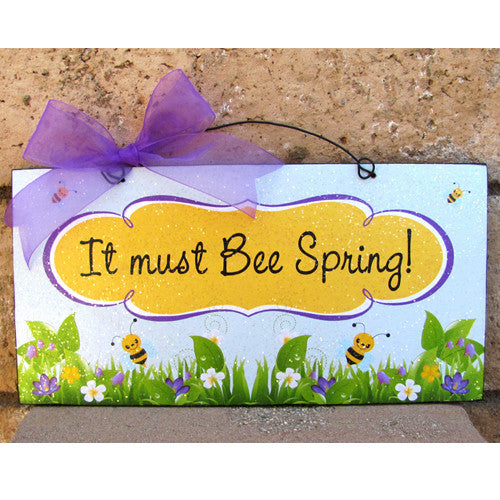 It must be Spring. Spring sign with bees.