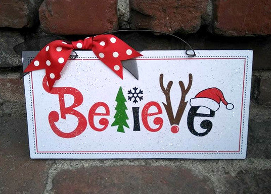 Believe Christmas sign.
