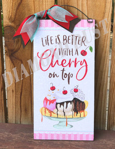 Live life with a Cherry on top sign.