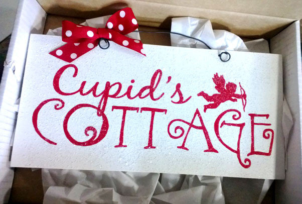 Cupids Cottage sign.