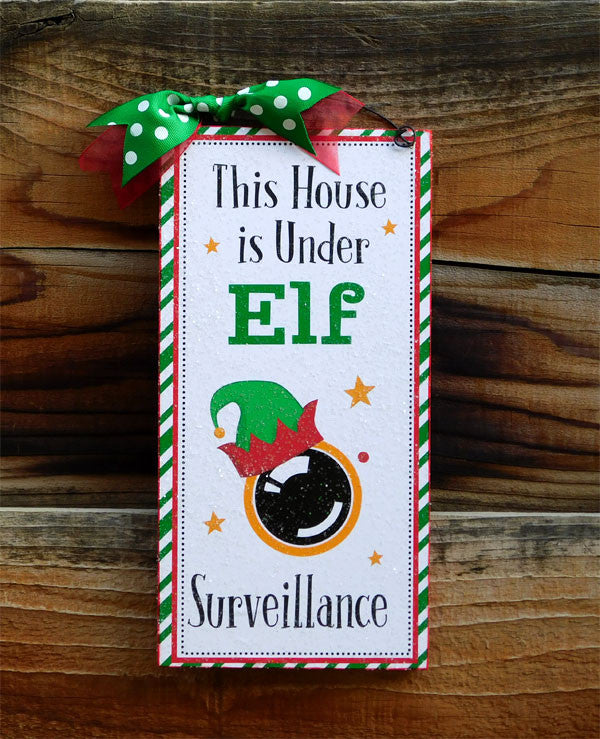 Elf Surveillance sign.