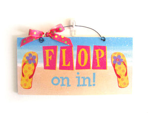 Flop on in. Summer sign.