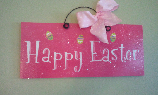 Happy Easter sign with Ester Eggs.