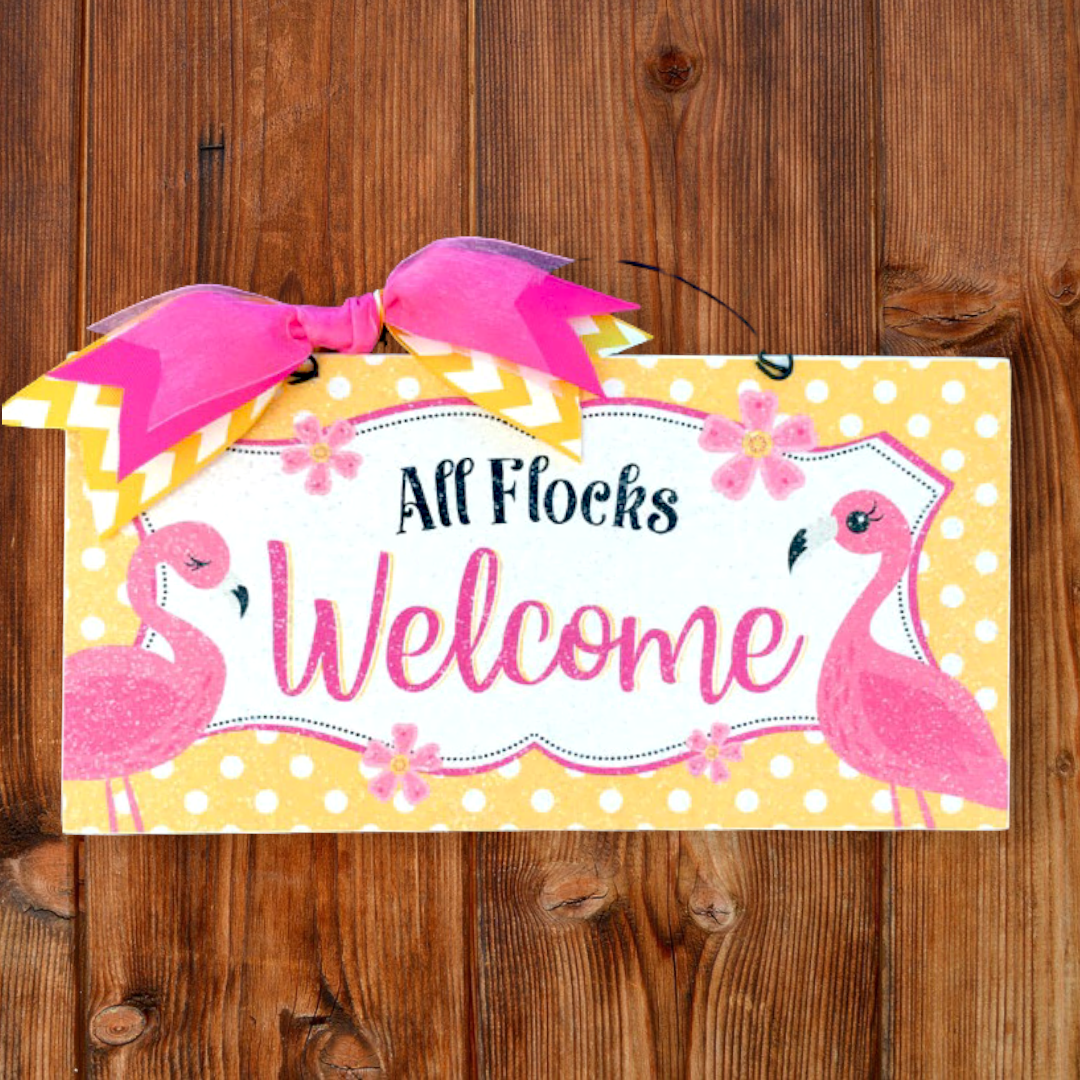 All Flocks Welcome. Flamingo sign.