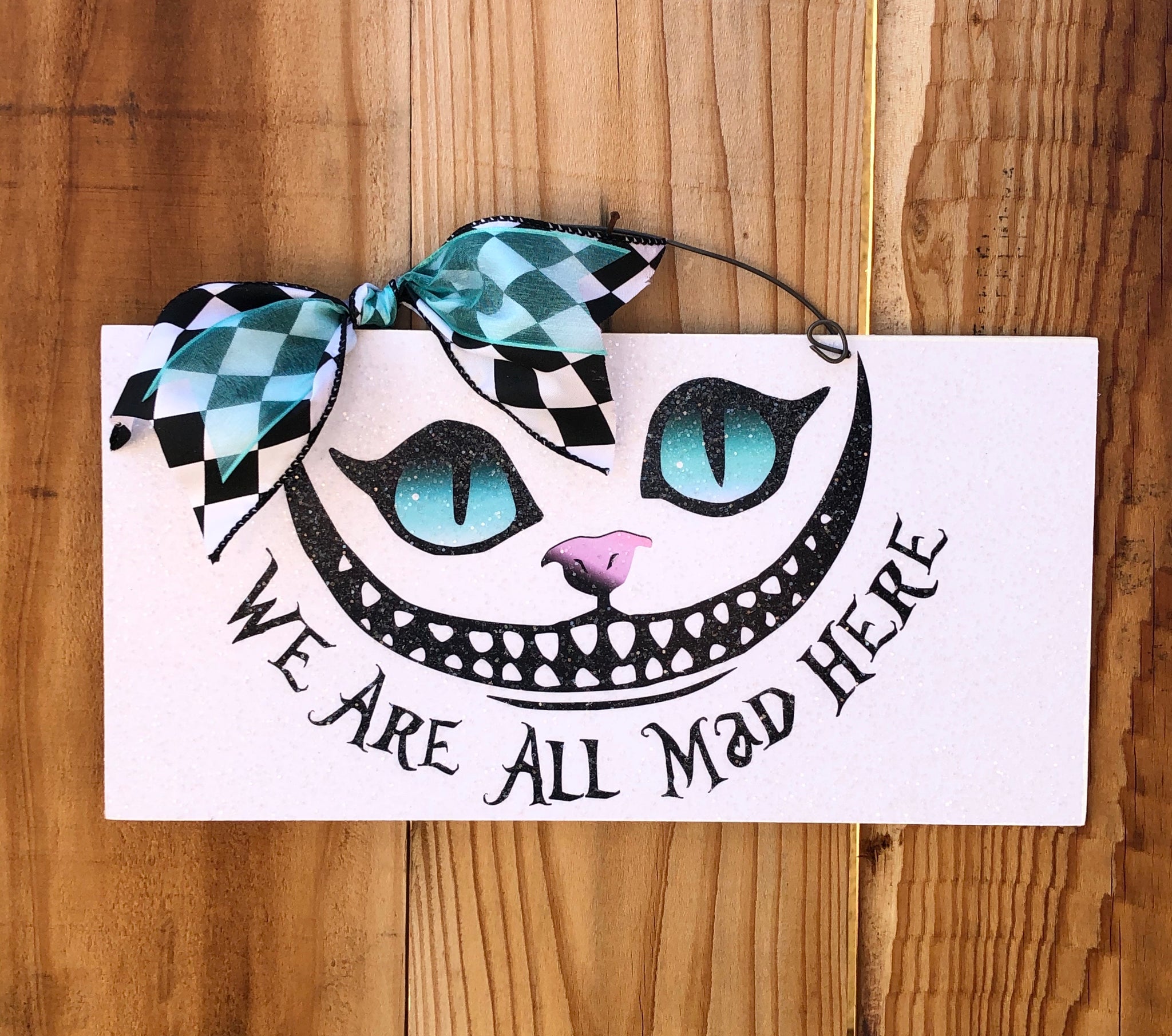 Cheshire Cat. Were all mad here