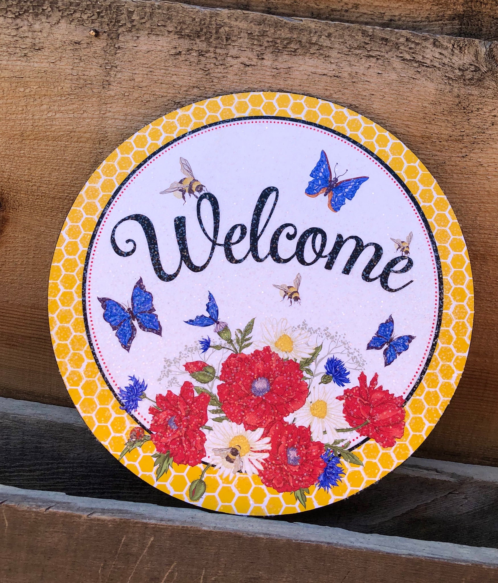 Welcome Poppy round sign.