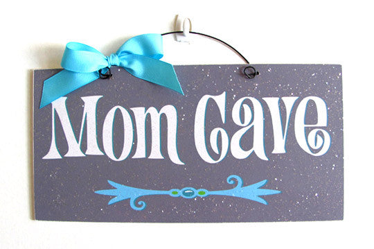 Mom cave sign.