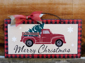 Merry Christmas red truck sign.