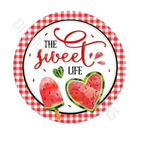 The Sweet Life round watermelon sign.